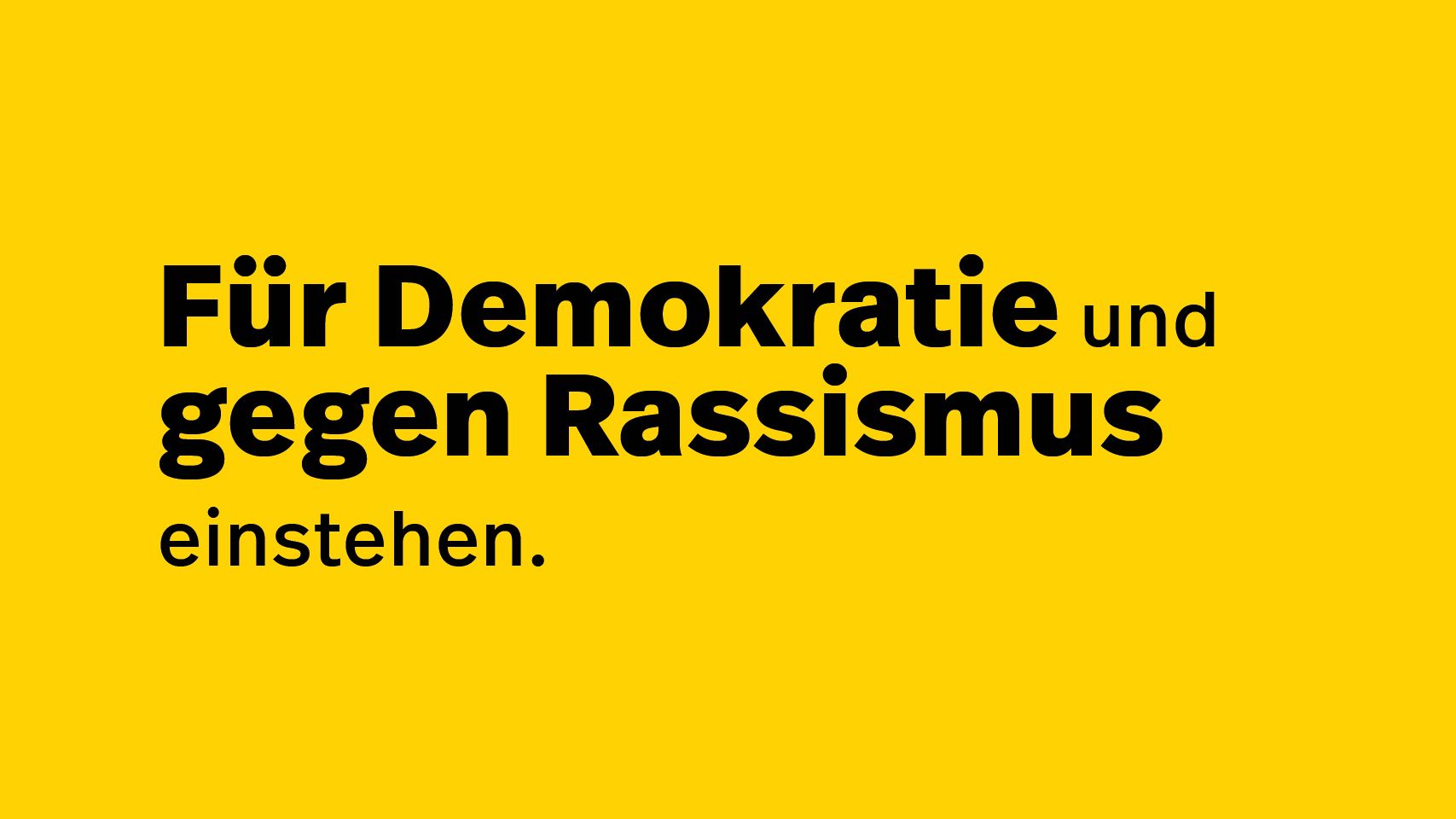 Banner mit einem Statement für Demokratie und gegen Rassismus (verweist auf: Für Demokratie und gegen Rassismus)