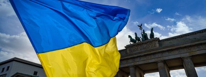 Flag of Ukraine in front of the Brandenburg Gate in Berlin